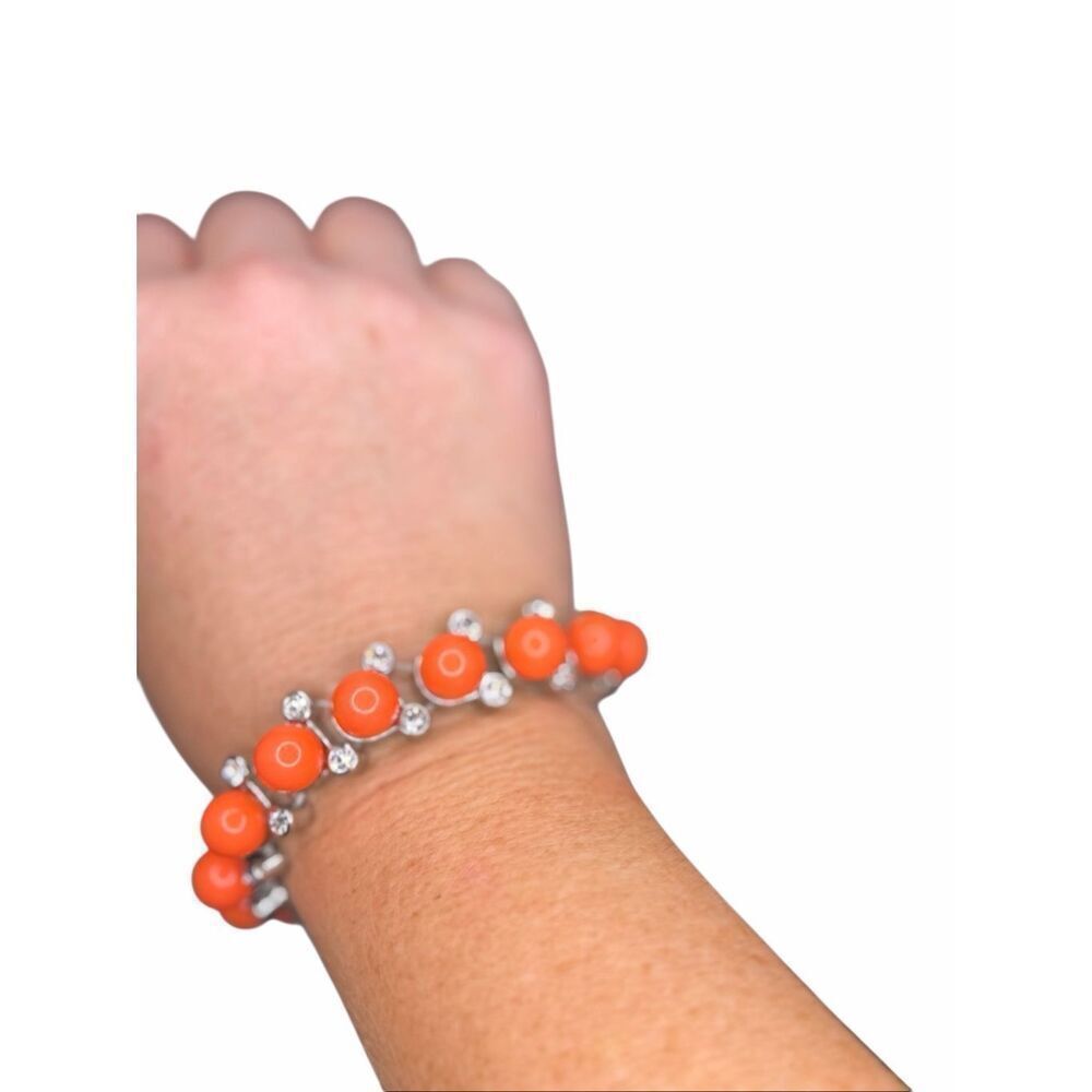 Anthropologie coral orange and crystal beaded bracelet